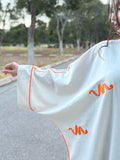 Abaya Farasha Écrue — Broderie Orange